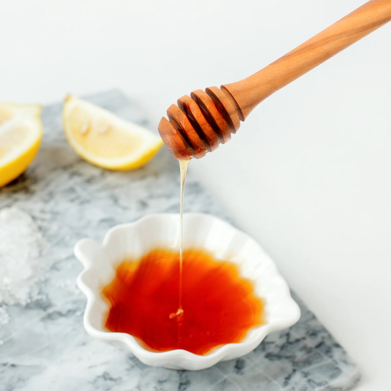 Drizzle sweet moments 🍯  ✨️ This handcrafted Olive Wood Honey spoon adds a rustic touch to your kitchen.        Natural. Elegant. Calacasa