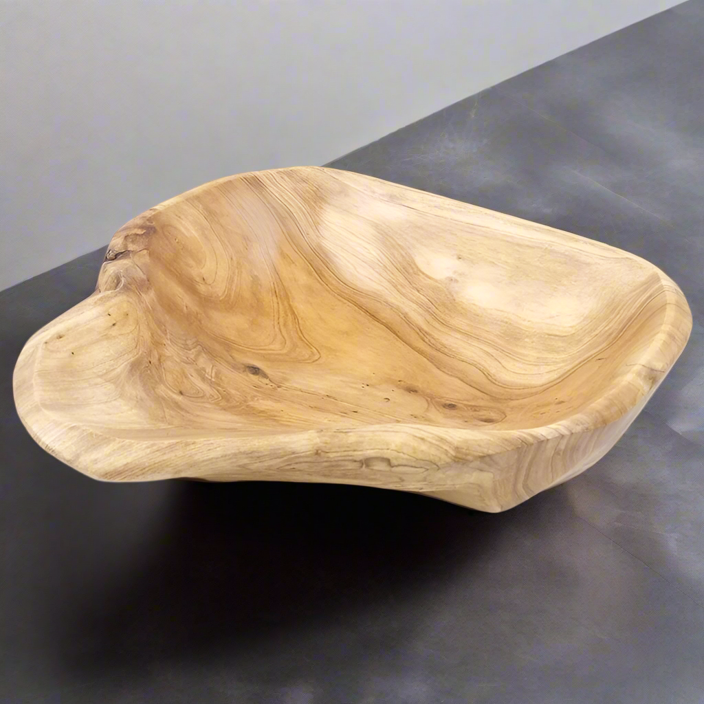 A beautifully handcrafted wooden salad bowl made to elevate everyday dining. Sustainbly carved, naturally elegant.                             Handcrafted. Natural. Timeless