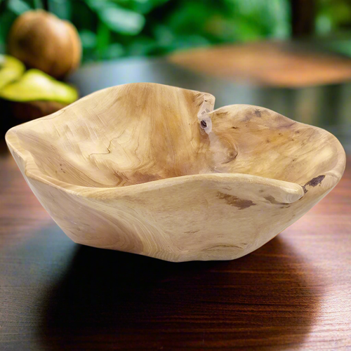 A beautifully handcrafted wooden salad bowl made to elevate everyday dining. Sustainbly carved, naturally elegant.                             Handcrafted. Natural. Timeless
