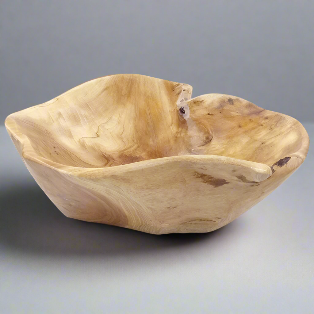 A beautifully handcrafted wooden salad bowl made to elevate everyday dining. Sustainbly carved, naturally elegant.                             Handcrafted. Natural. Timeless