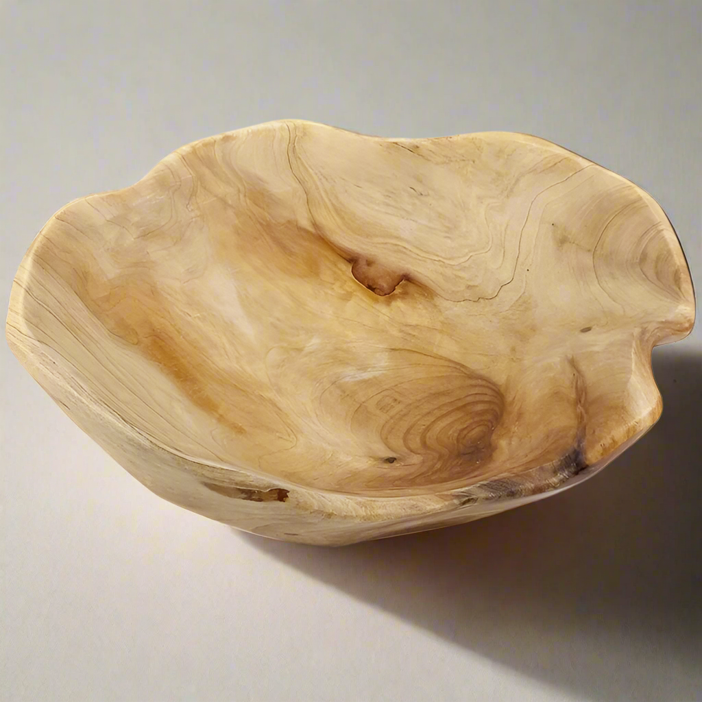 A beautifully handcrafted wooden salad bowl made to elevate everyday dining. Sustainbly carved, naturally elegant.                             Handcrafted. Natural. Timeless